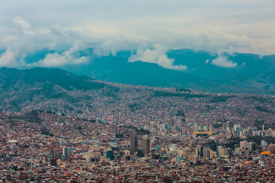 village houses and city buildings under white clouds during daytime in La Paz Bolivia