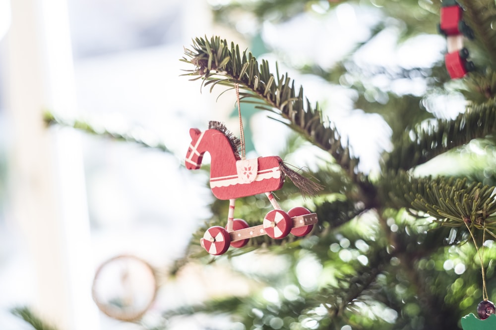 close-up photography of Christmas tree horse decoration