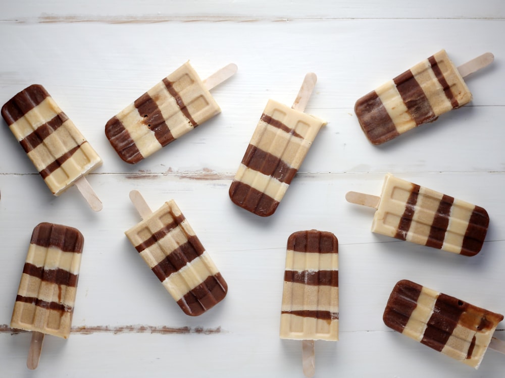 nine brown popsicles