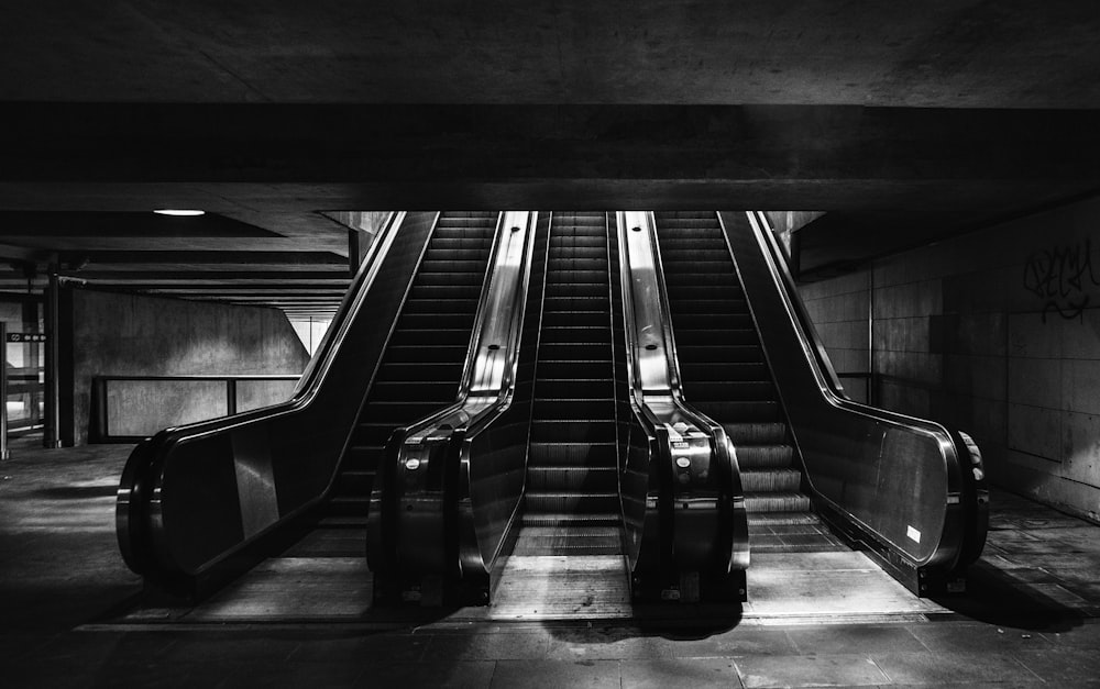 grayscale photography of escalator