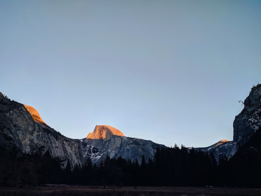 white mountain under clear sky during daytime