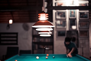person playing billiard