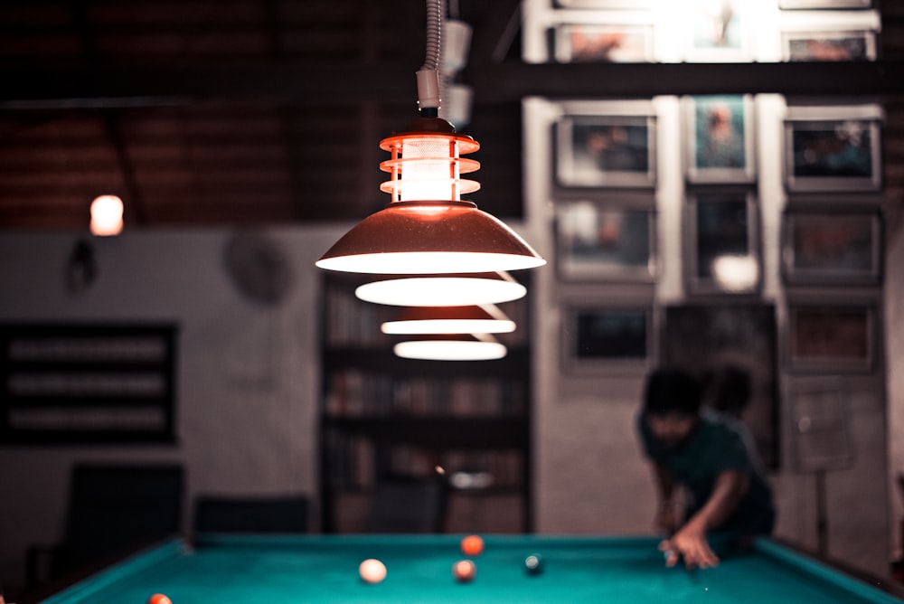 person playing billiard