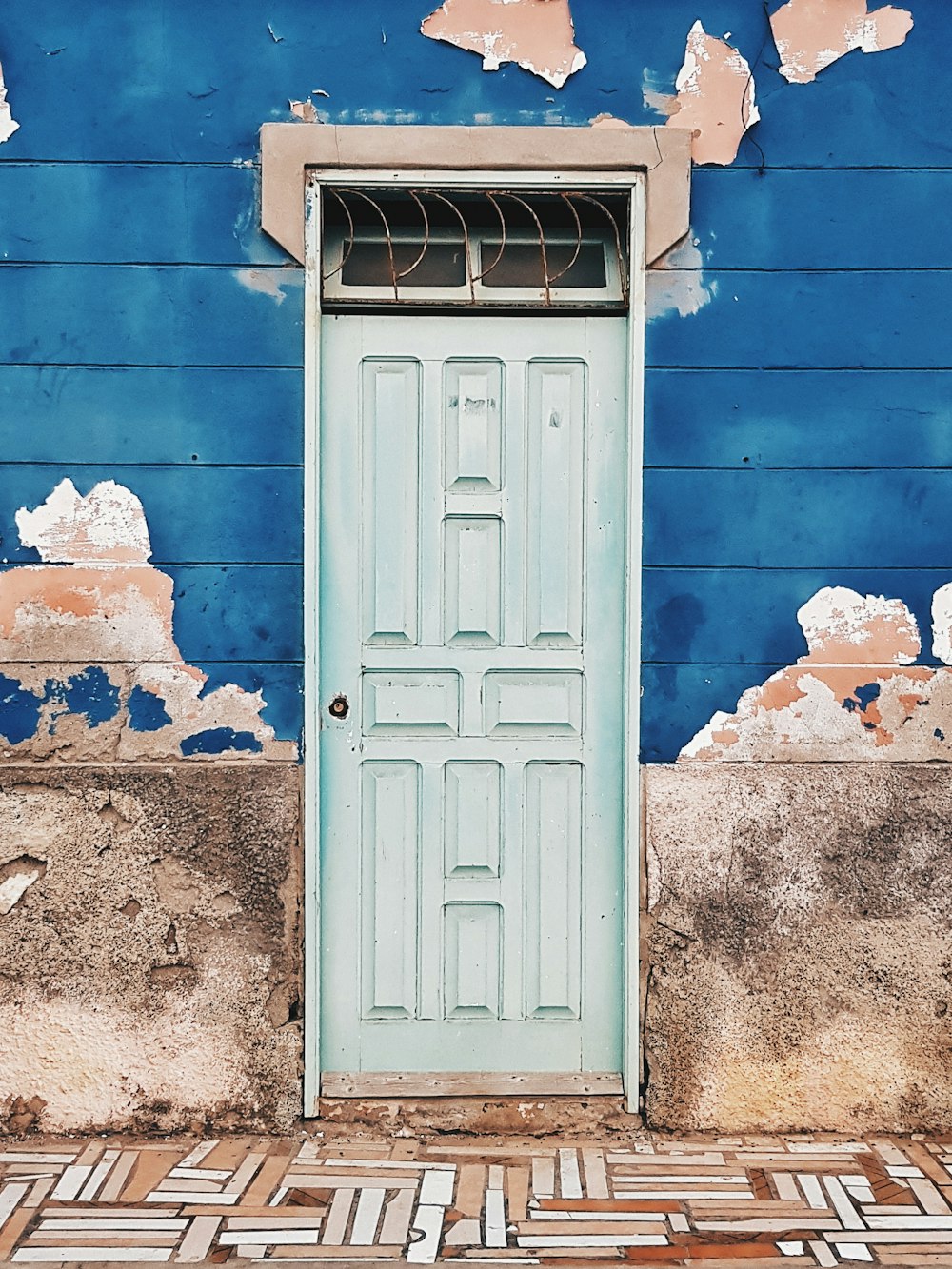 photo of building with white wooden door