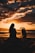 silhouette photo of woman and girl on shoreline