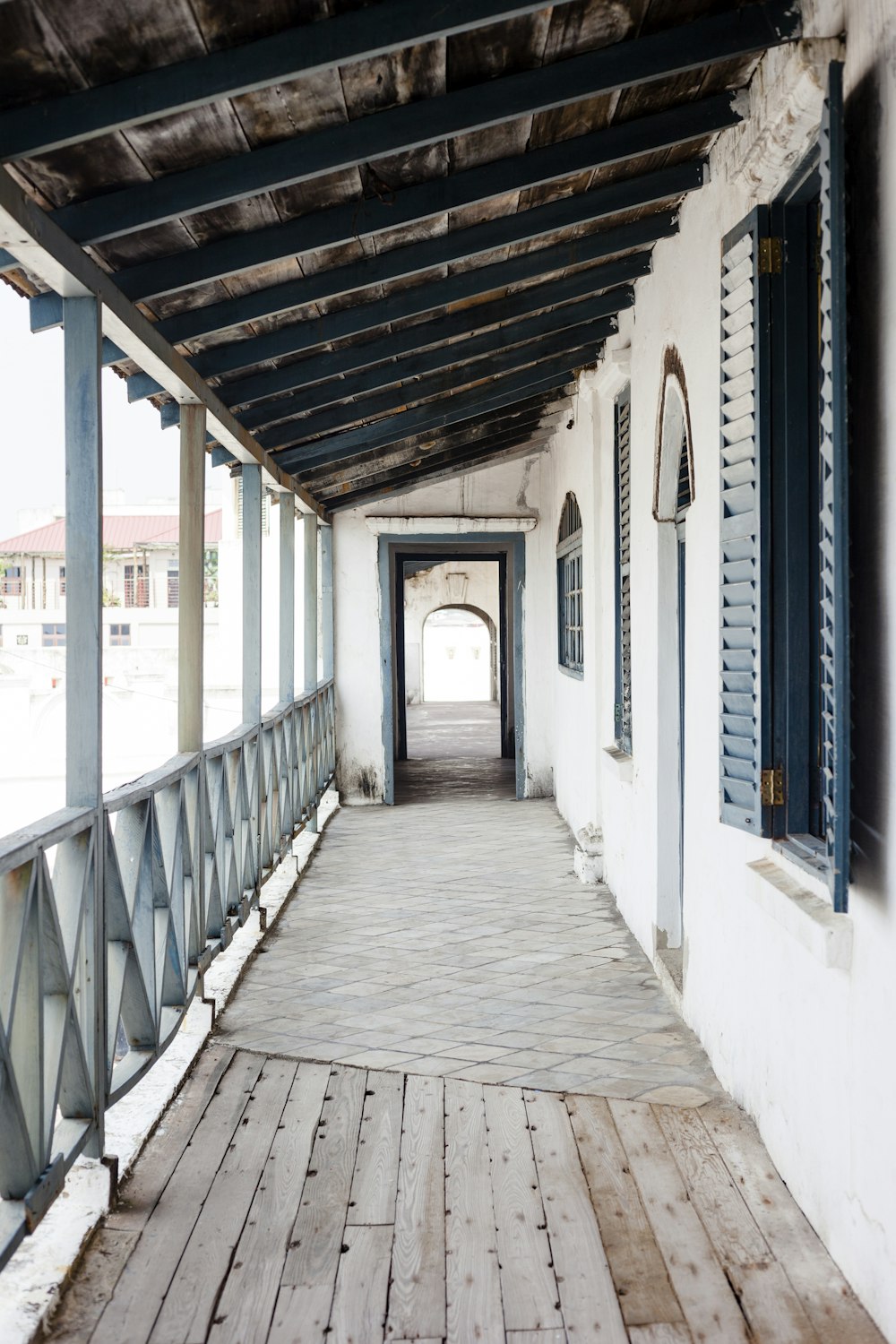 opened casement window beside empty terrace