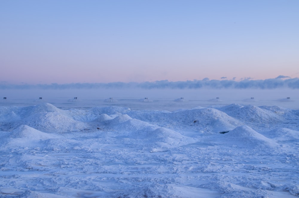 snow-covered field during daytime