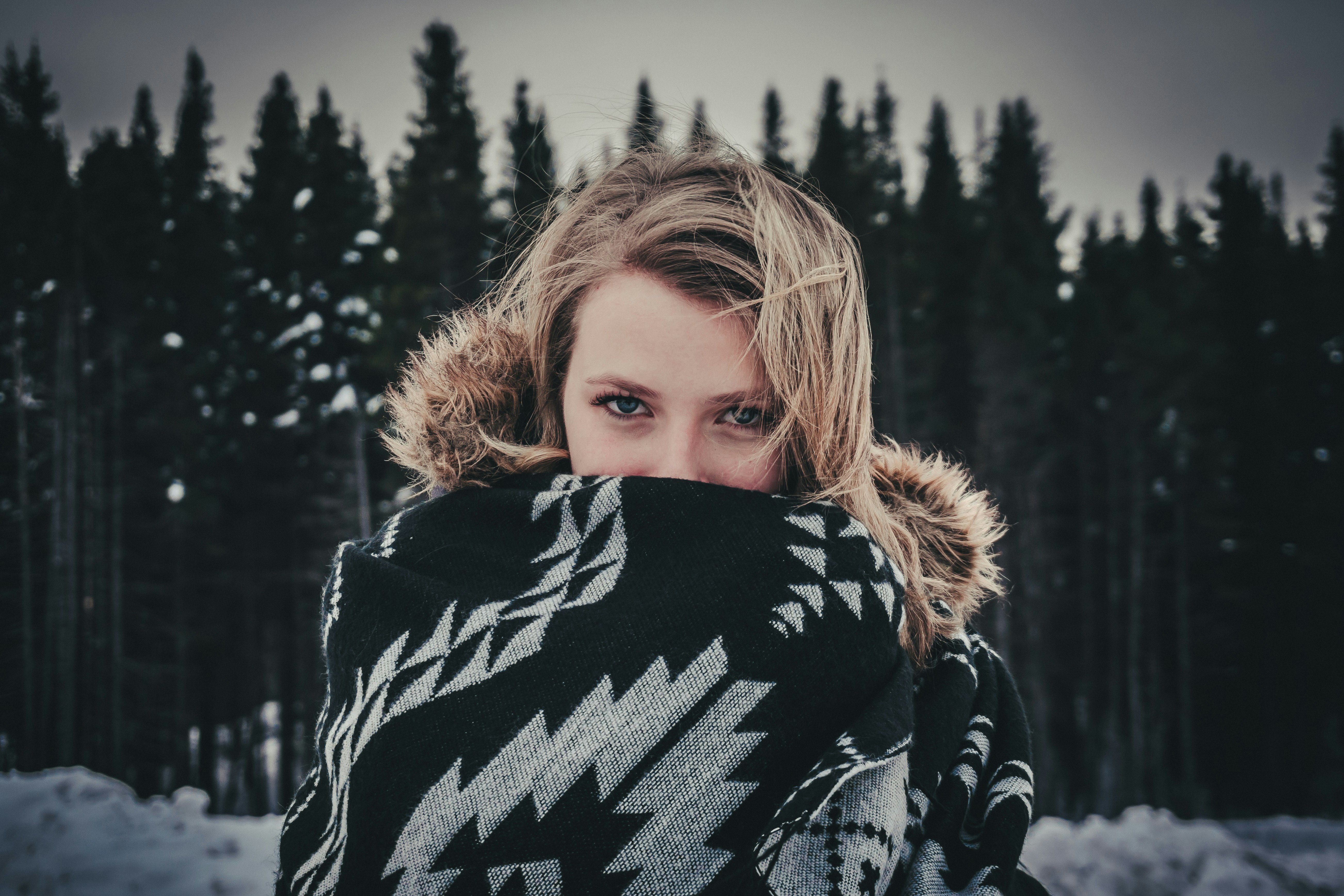 woman standing in froint of tree