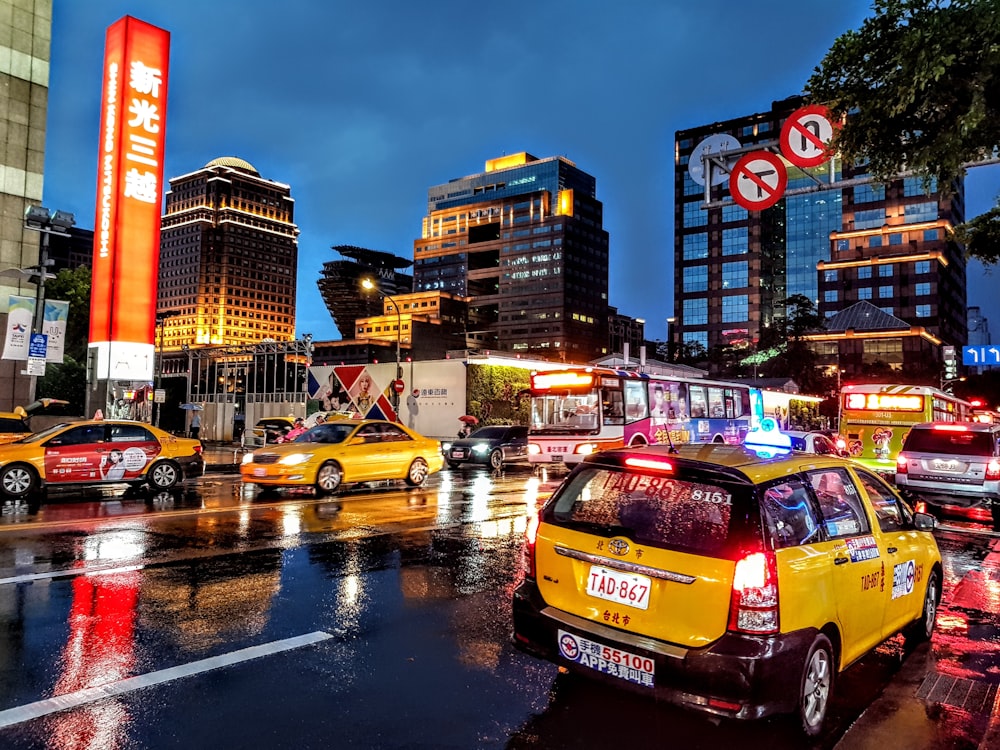 photo of cars on pavement