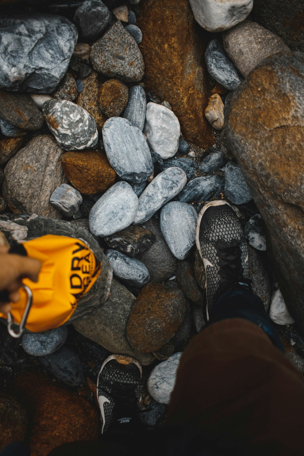 person wearing black Nike shoes