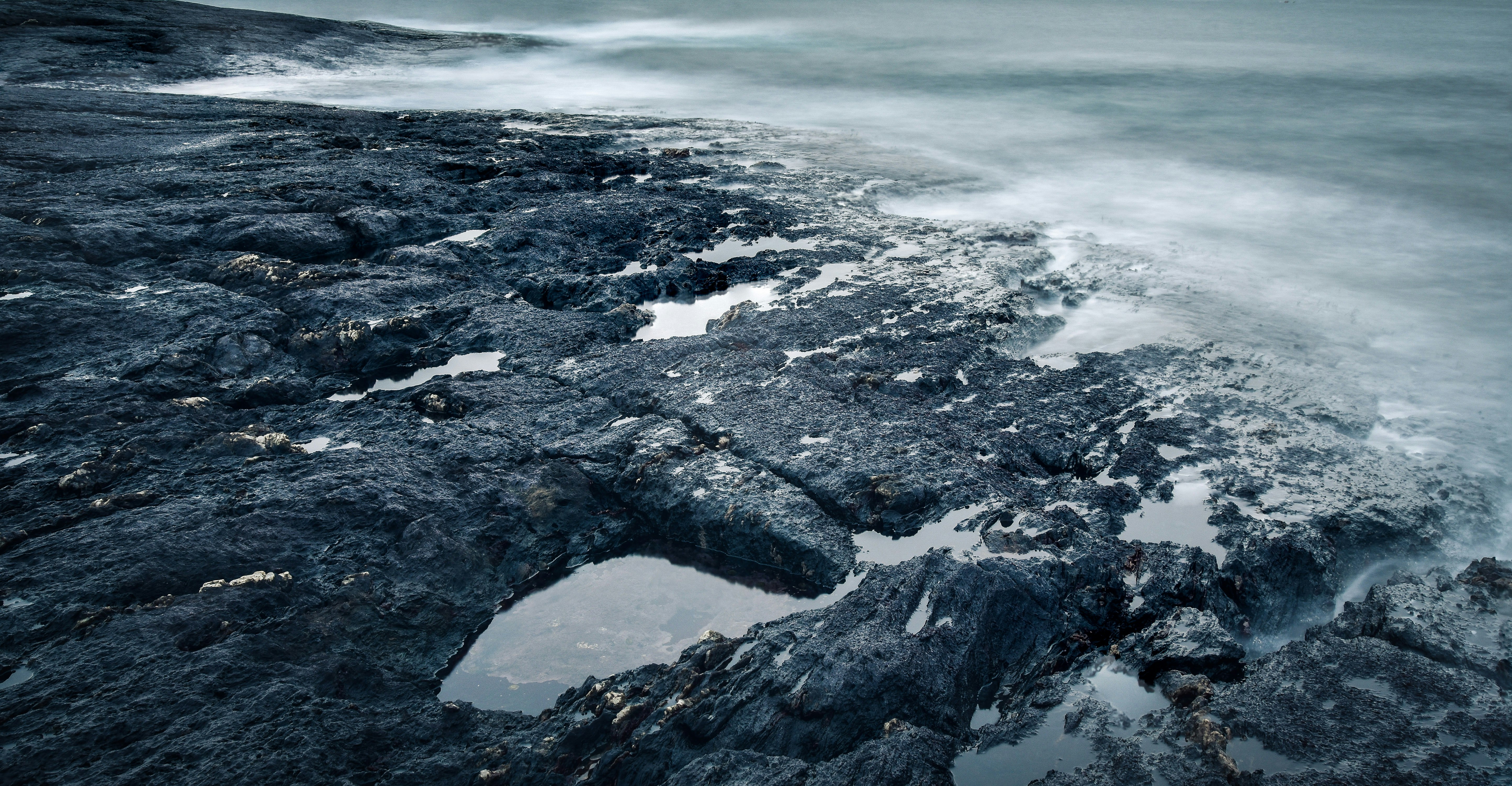 time lapse photography of seashore