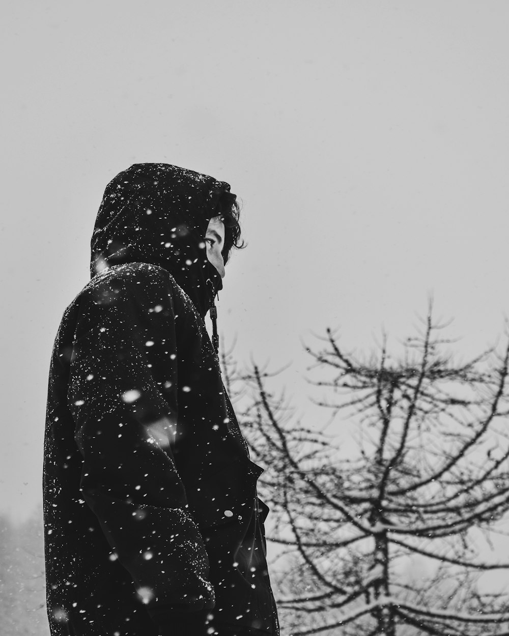 man wearing black hoodie