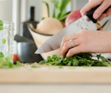 person cutting vegetable-subtitle-Consider the Nutritional Factors-topic-How to Get Lean Mass Body