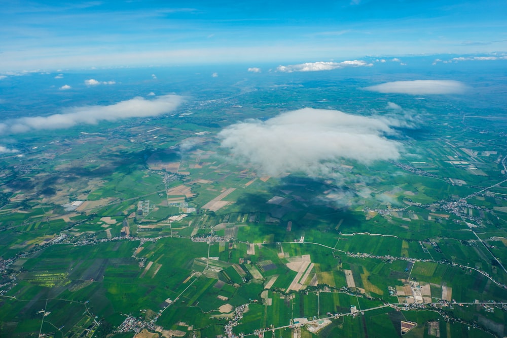 bird's-eye view of clouds and field