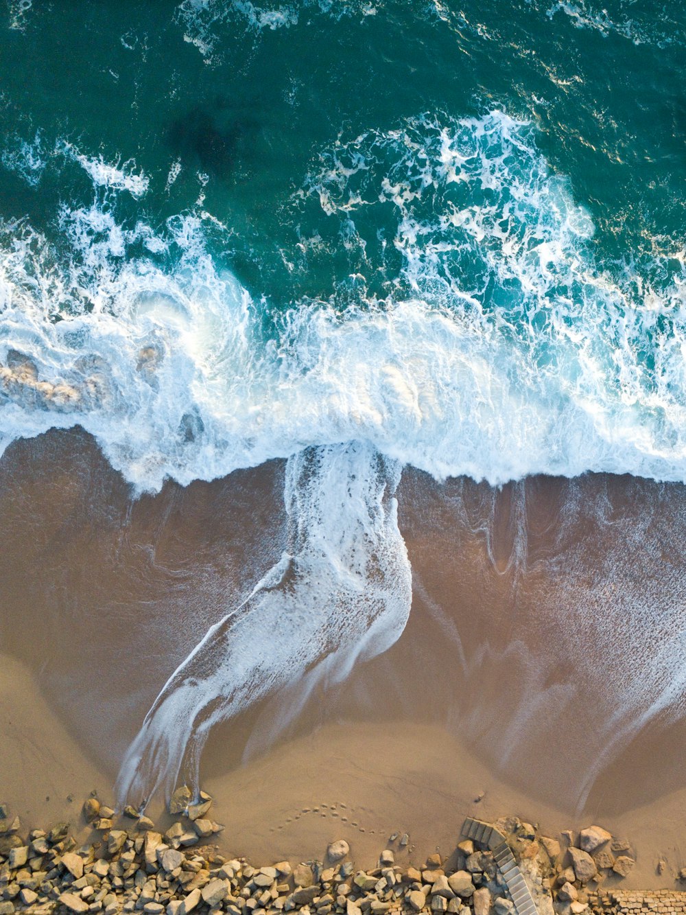 top view of ocean wave on seashore