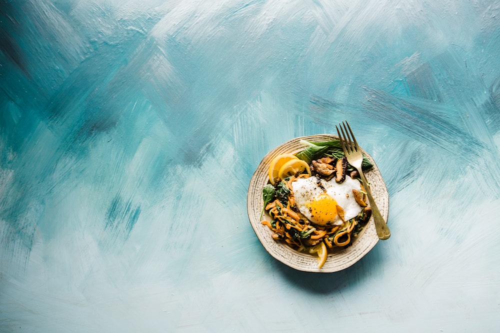 pasta dish on brown plate