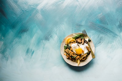 pasta dish on brown plate food zoom background