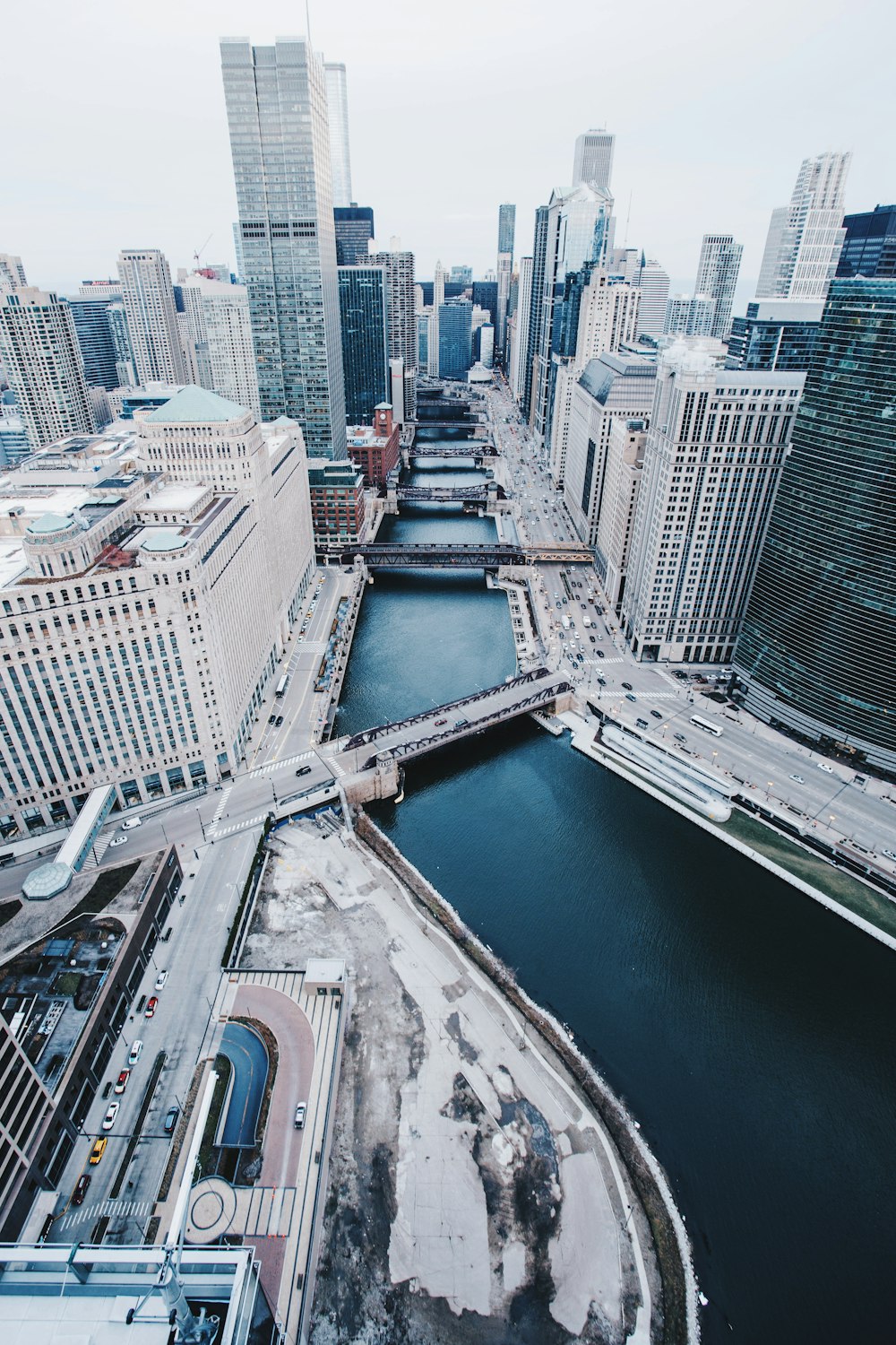 aerial view photography of city buildings with body of water