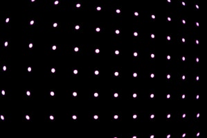 a black background with pink dots on it