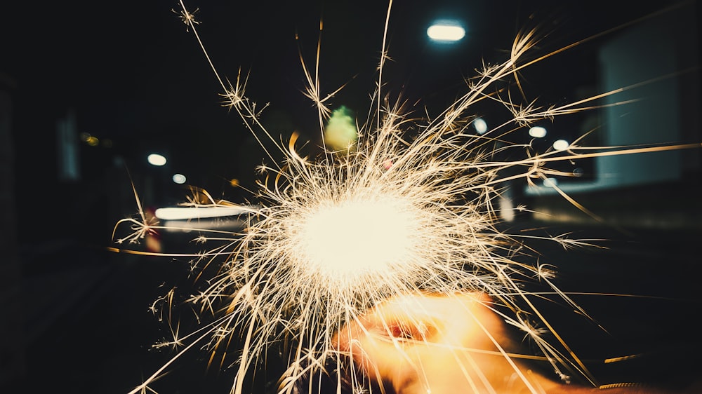 person holding firecracker