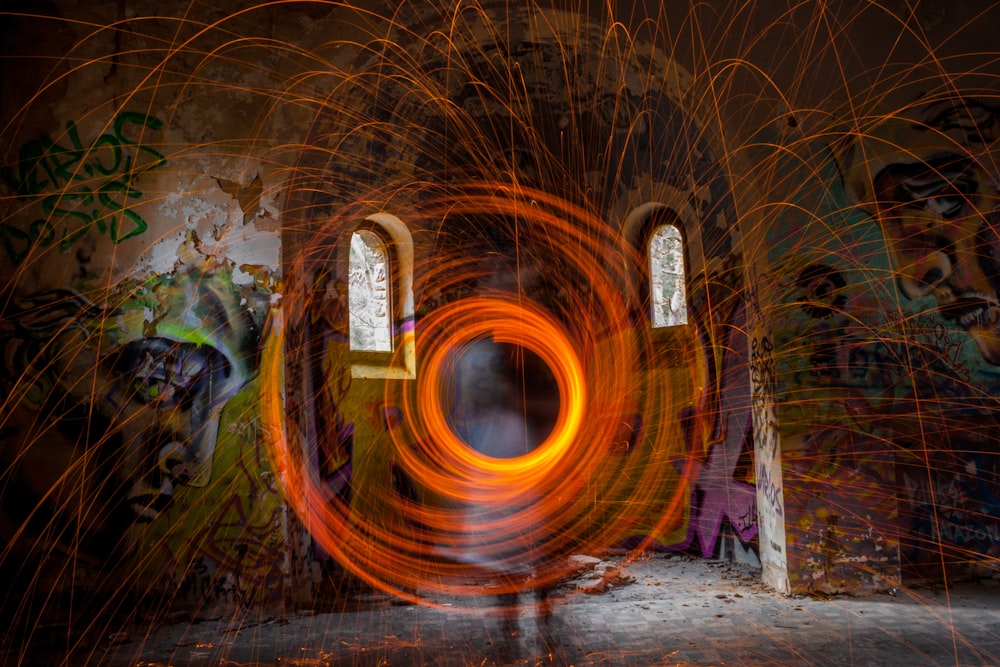 steel wool photography of person in room