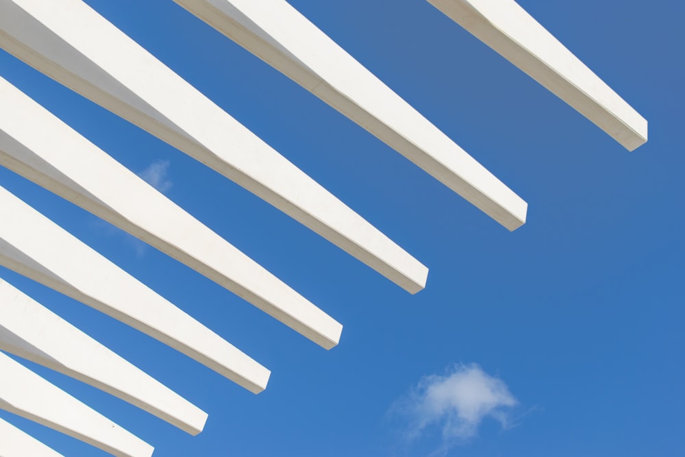 white wooden gondola under blue sky