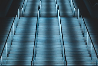 empty concrete stairs with metal handrail