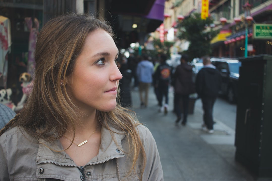 woman in gray zip up jacket