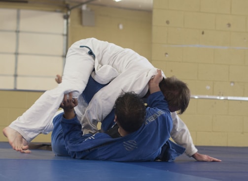 photo of two man wearing Taekwondo suit