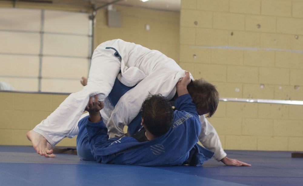 photo of two man wearing Taekwondo suit