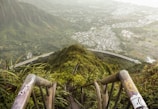 photo of man green mountain