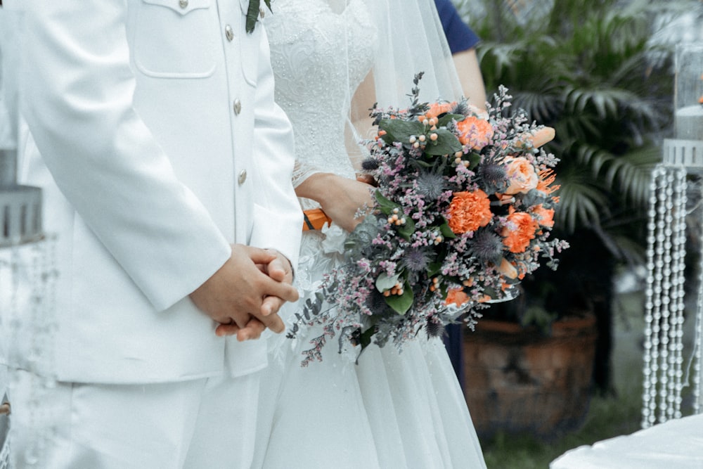 woman holding bridal bouquet