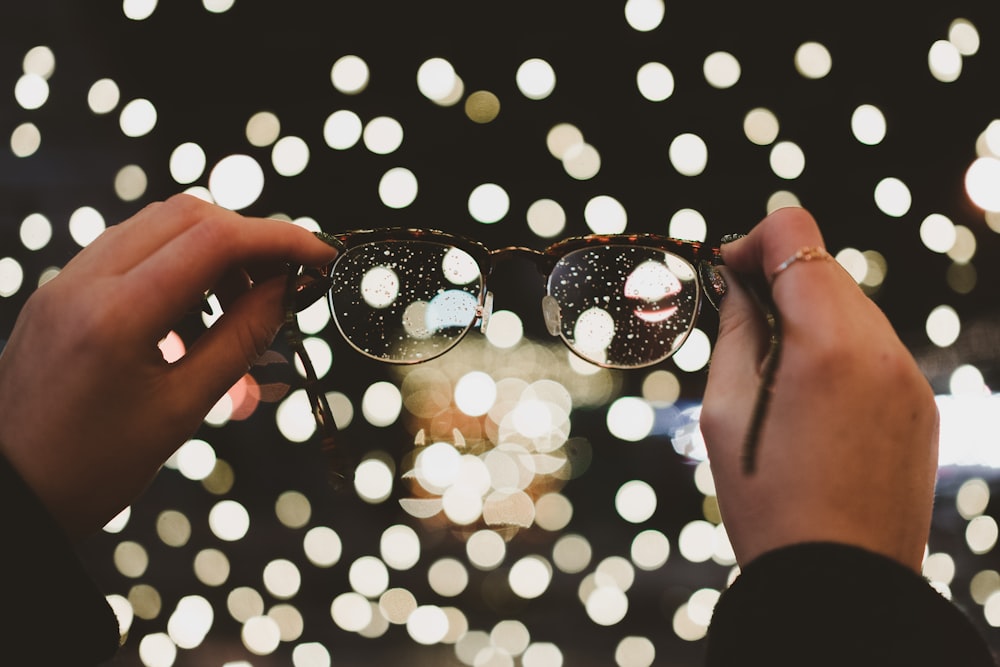 bokeh photography of eyeglasses