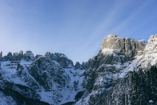 snow covered mountain peak during daytime in Molveno Italy