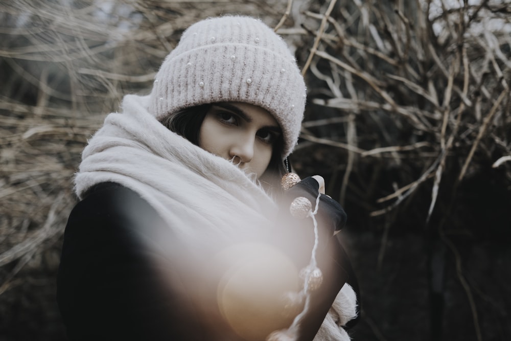 woman wearing gray knit hat