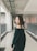 woman standing on hallway