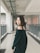 woman standing on hallway