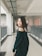 woman standing on hallway