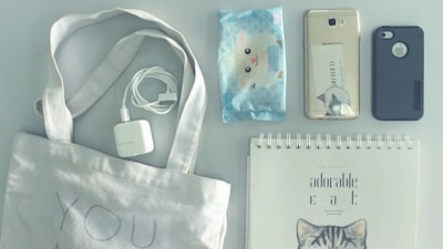 Colorful phone cases and chargers neatly arranged on a white background.