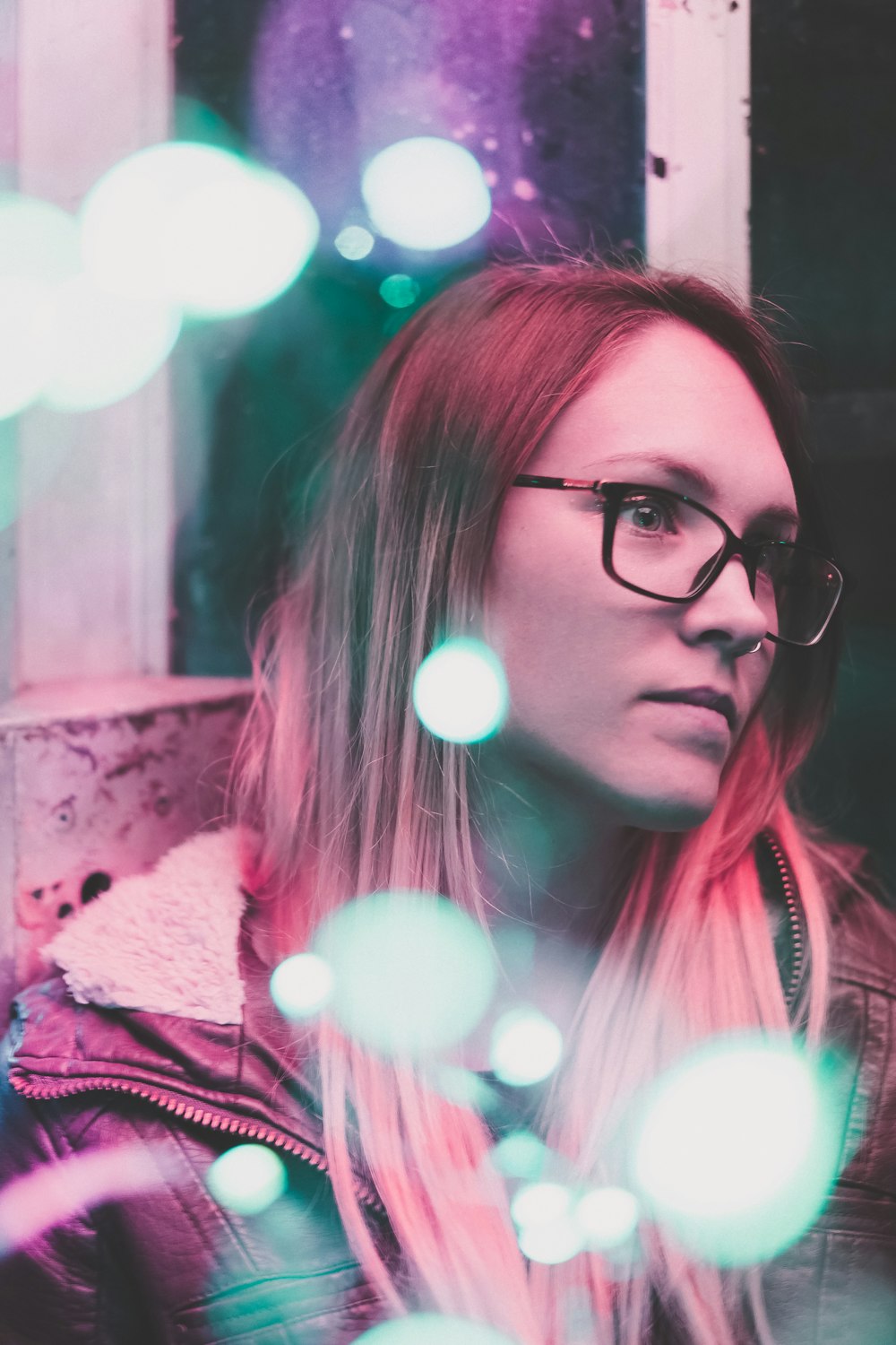 woman wearing black framed eyeglasses