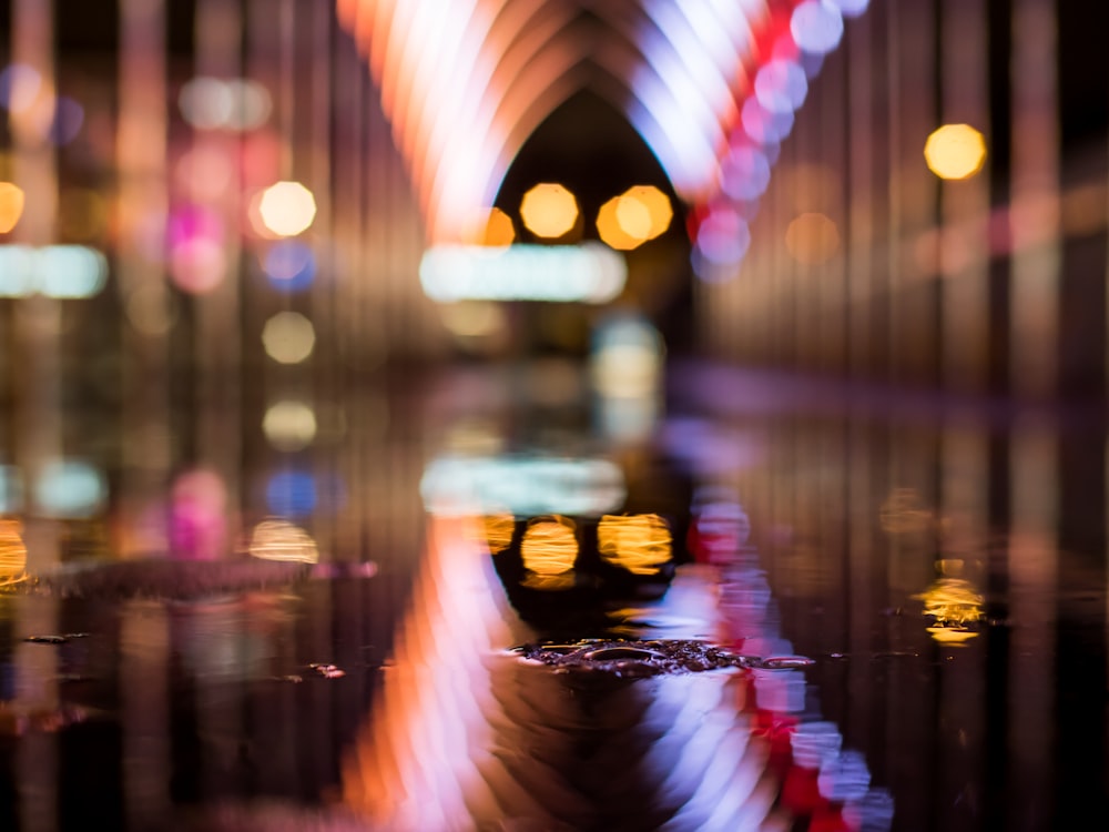 bokeh photography of water drop