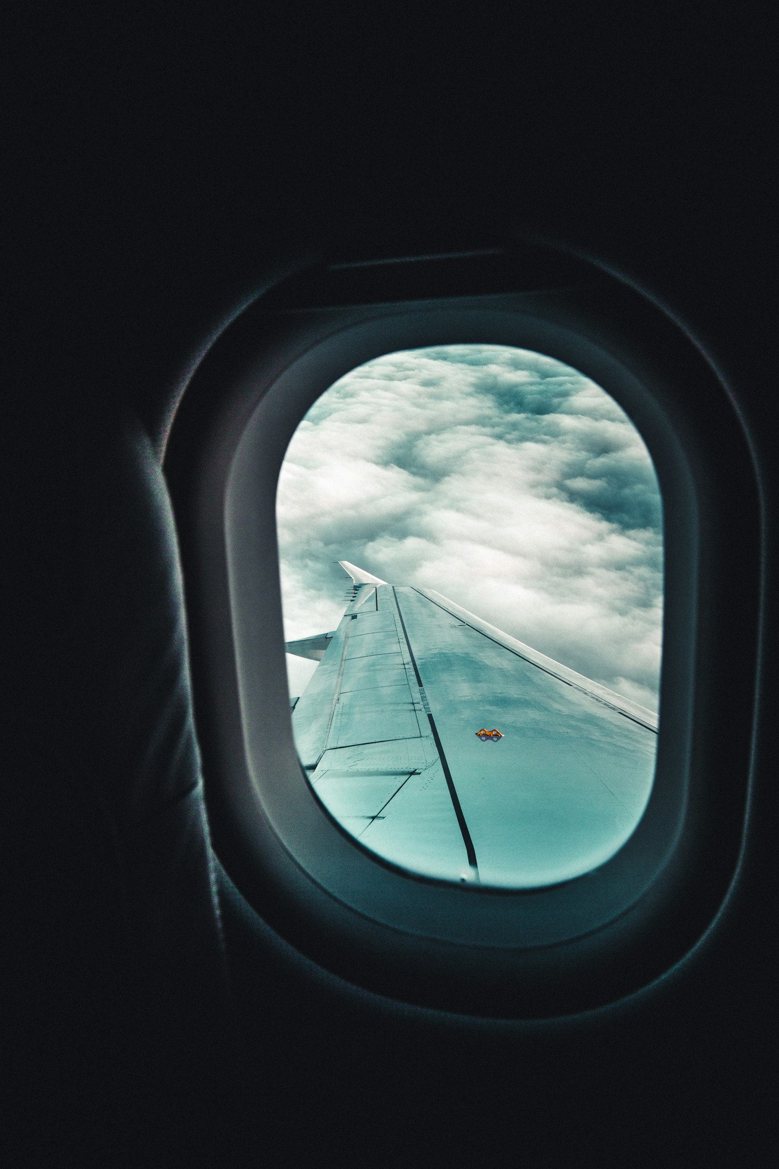 Canon EOS 5D Mark III + Sigma 24mm F1.4 DG HSM Art sample photo. View of airplane window photography