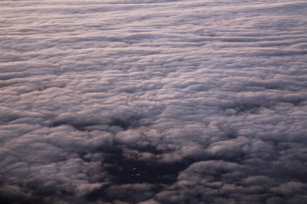 a view of clouds from an airplane window