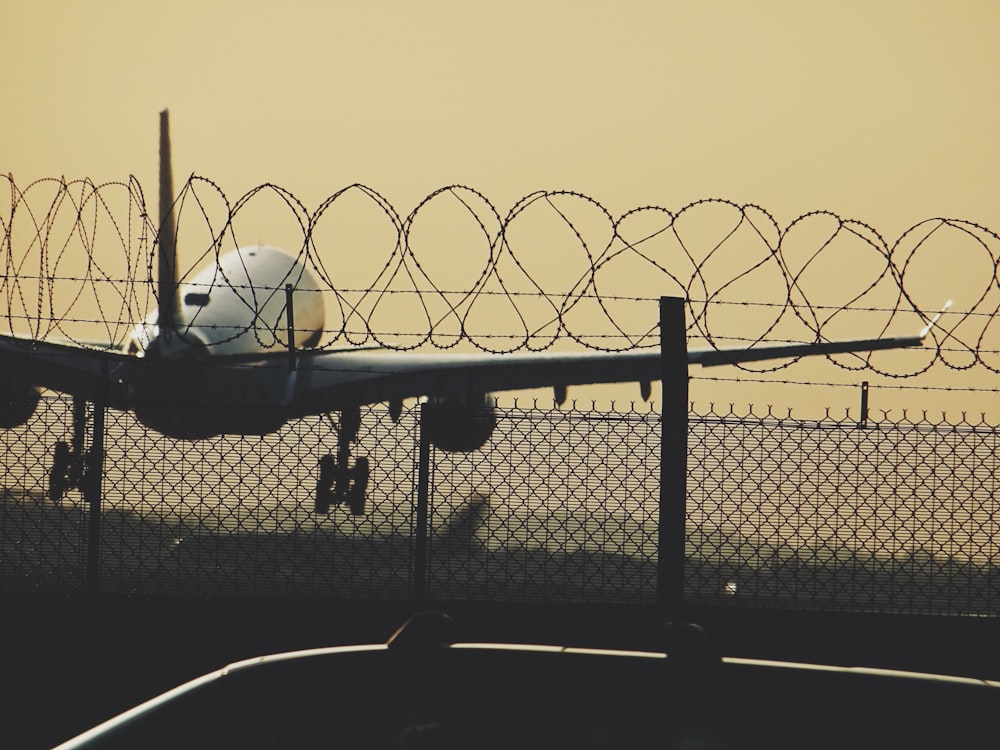 macro photography of white airplane