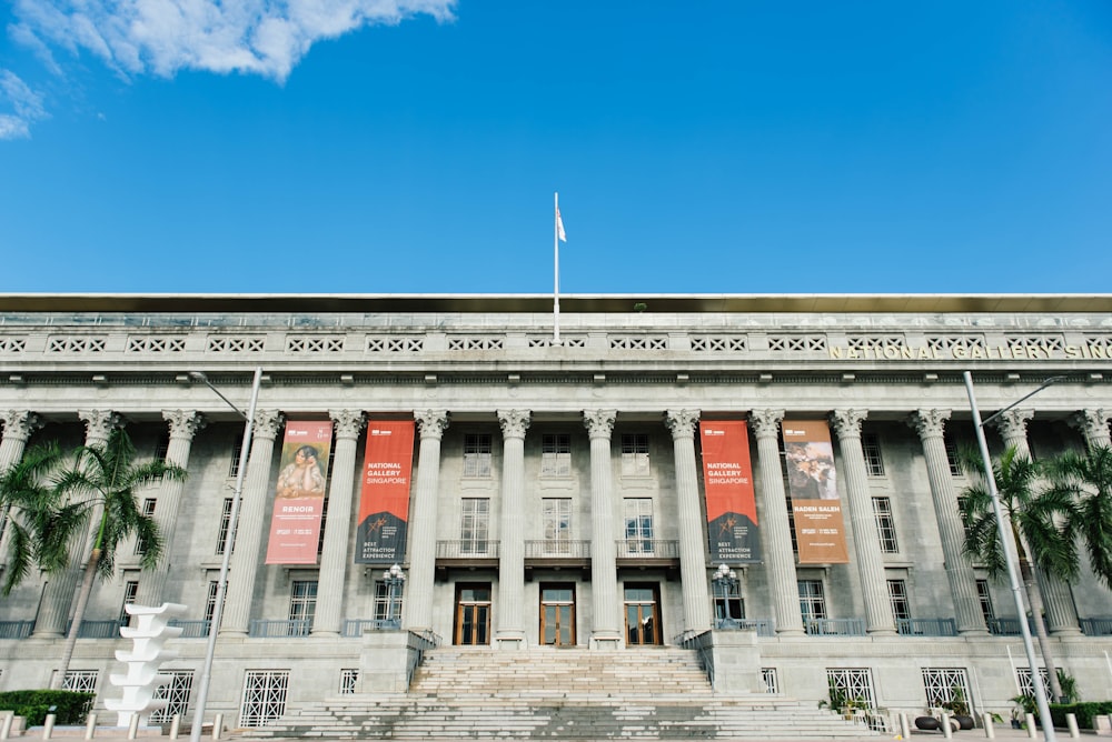 gray concrete building under calm blue sky