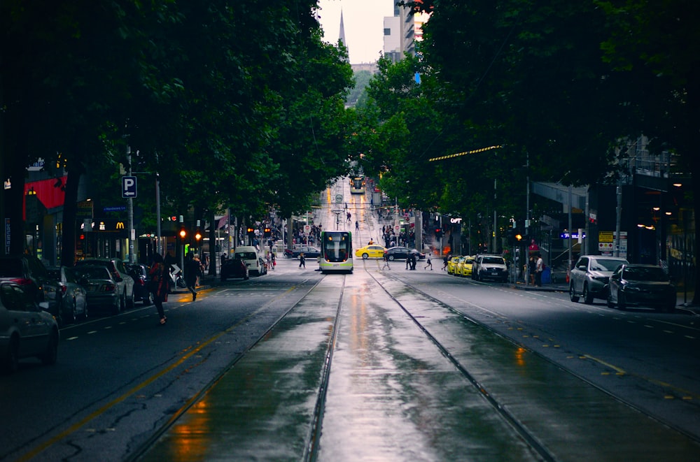 black and yellow bus on asphalt road