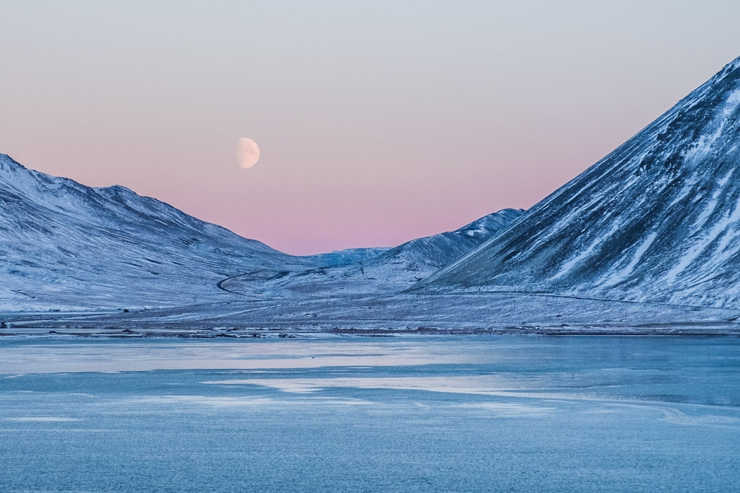 mountain near clear river