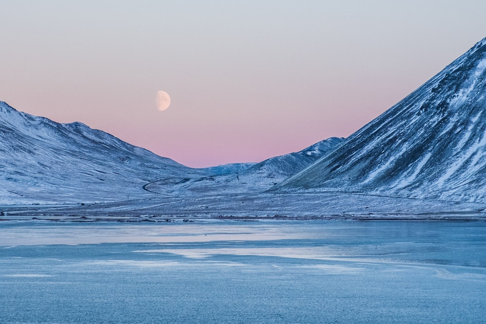 mountain near clear river