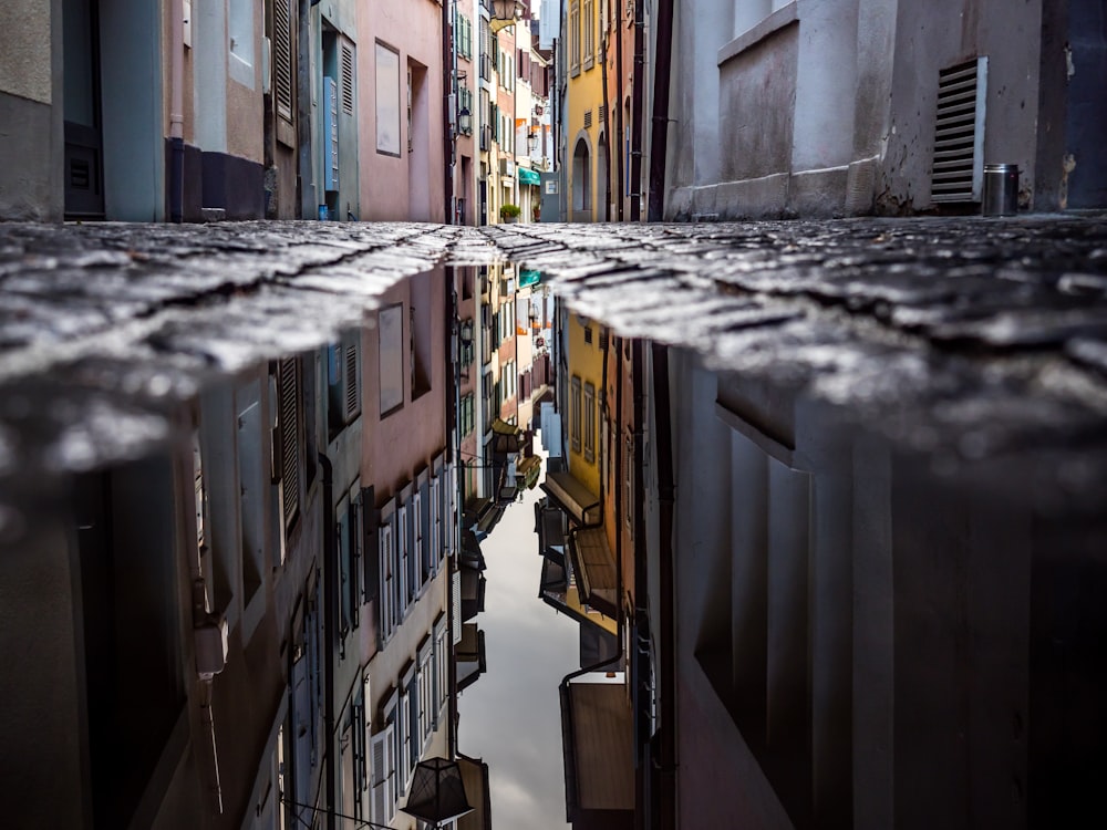 worm's eye view of pathway between houses