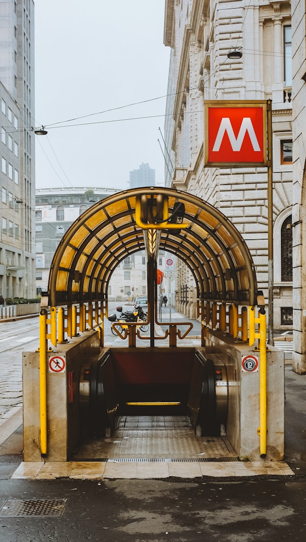 A subway entrance that is an escalator.